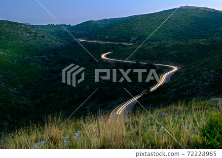 winding road in the high mountains 72228965