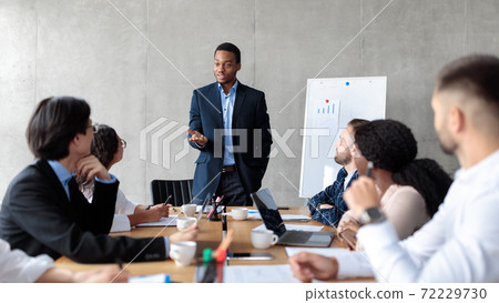 Discontented African Businessman Giving Speech During Corporate Meeting In Office 72229730