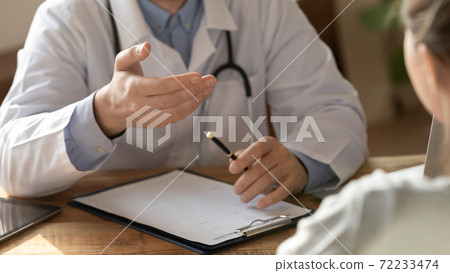 Close up of male doctor talk consult patient Close up of male doctor talk consult patient 72233474