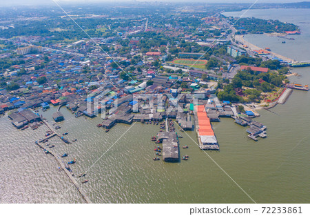 Aerial view of Ang Sila in Sri Racha district with sea, Chonburi skyline, Thailand. Urban city in Asia. Architecture landscape background. Aerial view of Ang Sila in Sri Racha district with sea, Chonburi skyline, Thailand. Urban city in Asia. Architecture landscape background. 72233861