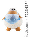 Cute soft toy sheep in a medical mask on a white background. Isolate. 72234374