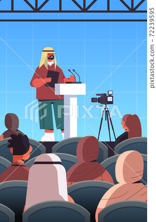 arab male doctor giving speech at tribune with microphone medical conference meeting arab male doctor giving speech at tribune with microphone medical conference meeting 72239595