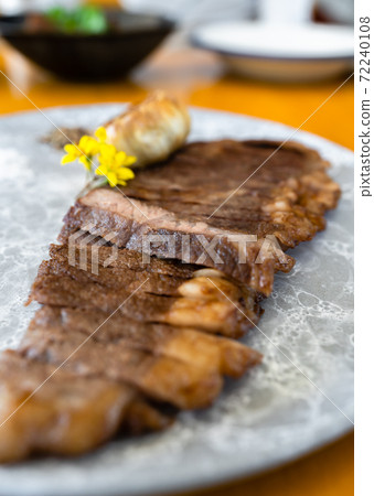 wagyu beef well done steak in plate 72240108