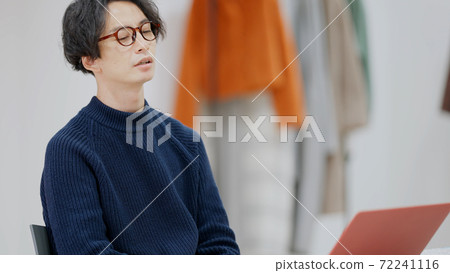Young man thinking about fashion design 72241116