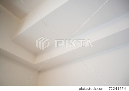 Down ceiling by beams of a new condominium Down ceiling by beams of a new condominium 72241254