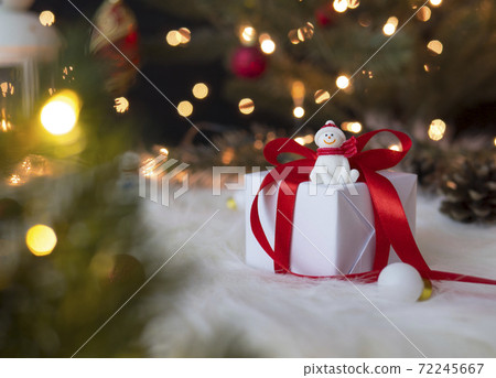 Snowman on white gift box for christmas holiday concept 72245667