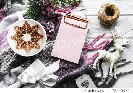 Christmas or winter composition. Coffee and decorations. Christmas or winter composition. Coffee and decorations. 72245985
