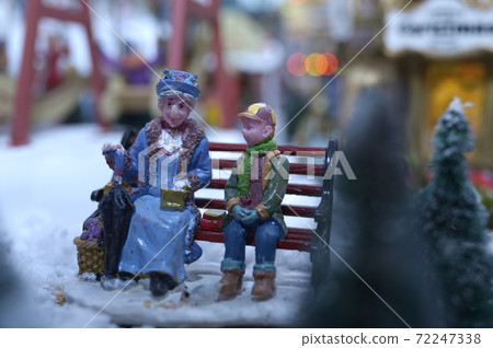 Christmas decorations, dummy toys, set on miniature park background Christmas decorations, dummy toys, set on miniature park background 72247338