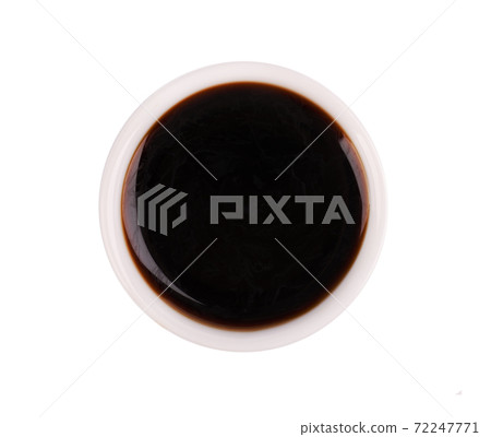 Soy sauce in bowl, isolated on white background. Sauce for fish and sushi. Top view. Soy sauce in bowl, isolated on white background. Sauce for fish and sushi. Top view. 72247771