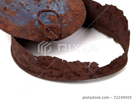 Part of old rusty tin can on white background Part of old rusty tin can on white background 72249505