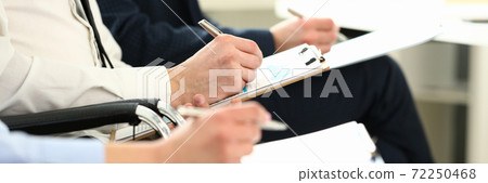 Hardworking business people Hardworking business people 72250468