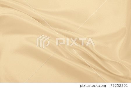 Smooth elegant golden silk or satin luxury cloth texture as wedding background. Luxurious background design. In Sepia toned. Retro style 72252291