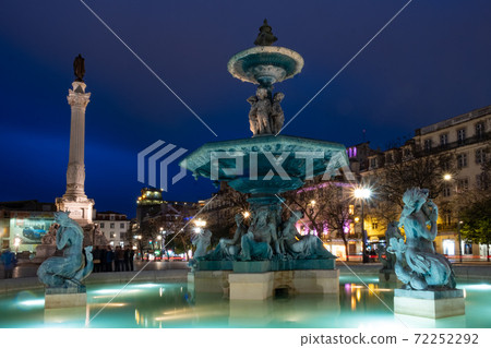 Illuminated fountain with Column of Pedro IV at Rossio Square in Lisbon, Portugal Illuminated fountain with Column of Pedro IV at Rossio Square in Lisbon, Portugal 72252292