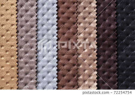 Swatch of leather textile brown and gray colors, background. Swatch of leather textile brown and gray colors, background. 72254754