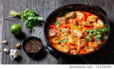 Moqueca baiana - brazilian fish stew with lime Moqueca baiana - brazilian fish stew with lime 72256369