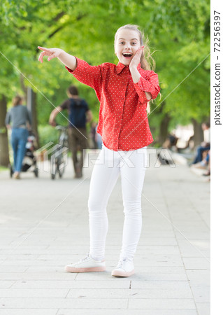 Childhood play and leisure in nature. Happy little child  72256397