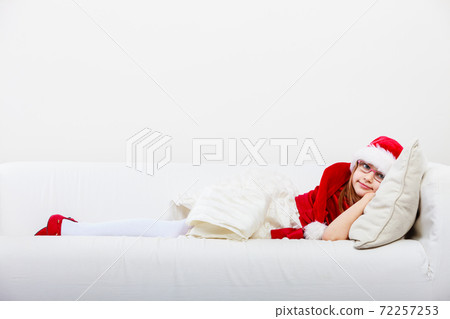 Cute little lady crawling on sofa. Cute little lady crawling on sofa. 72257253