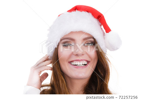 Woman in santa claus hat free and happy Woman in santa claus hat free and happy 72257256