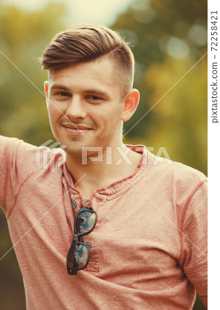 Relaxed man in park. Relaxed man in park. 72258421