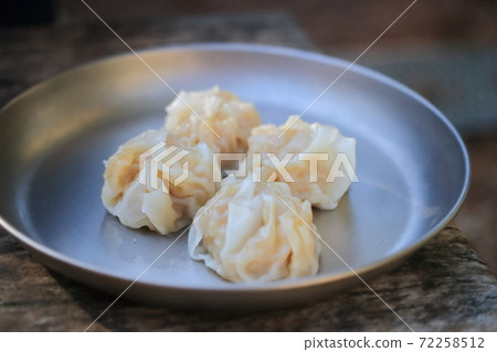 Steamed dumplings outdoors 72258512