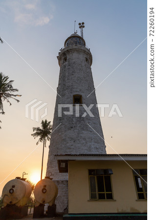 The old lighthouse of white stone located on the island The old lighthouse of white stone located on the island 72260194