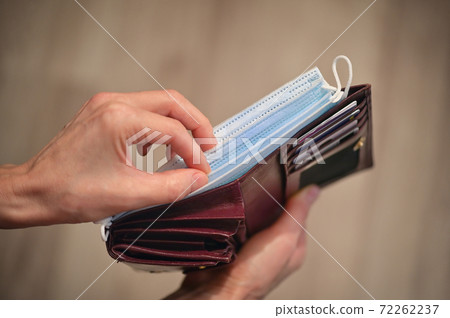 Conceptual Blue Medical Masks  Instead Of Money in Wallet 72262237