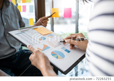 Startup business team discussing in strategy work process at modern office.. Startup business team discussing in strategy work process at modern office.. 72263255