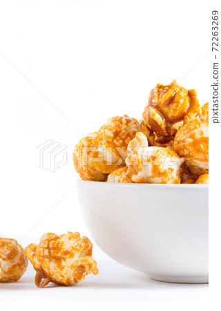 Sweet caramel candy popcorn in a bowl Sweet caramel candy popcorn in a bowl 72263269