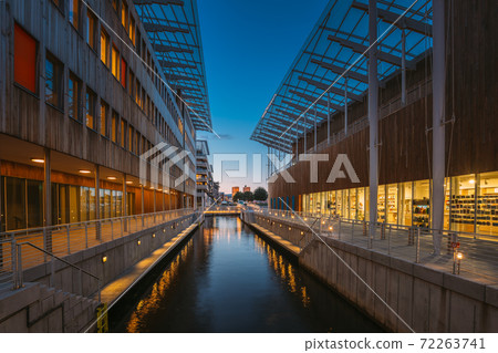 Oslo, Norway. Astrup Fearnley Museum of Modern Art, Residential Multi-storey Houses In Aker Brygge District In Summer Evening. Famous And Popular Place Oslo, Norway. Astrup Fearnley Museum of Modern Art, Residential Multi-storey Houses In Aker Brygge District In Summer Evening. Famous And Popular Place 72263741