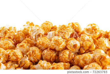 Sweet golden caramel candy popcorn bottom white Sweet golden caramel candy popcorn bottom white 72263783