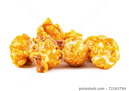 Sweet caramel candy popcorn pieces macro Sweet caramel candy popcorn pieces macro 72263784