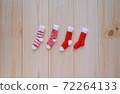 4 pairs of red miniature hand-knitted socks (horizontal position) 72264133