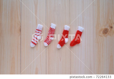 4 pairs of red miniature hand-knitted socks (horizontal position) 72264133