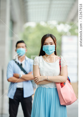 Vietnamese woman with medical mask on face Vietnamese woman with medical mask on face 72267918