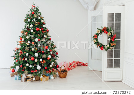 Winter Christmas Tree with gift decoration for the new year 72270272