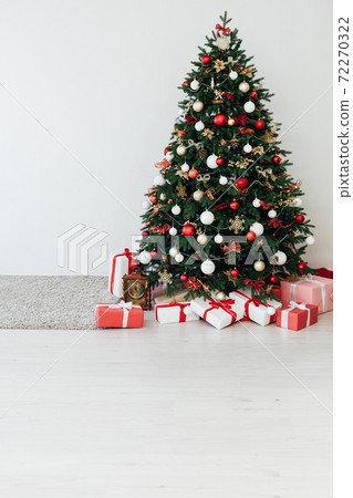 Christmas tree with gifts for the new year interior decor 72270322