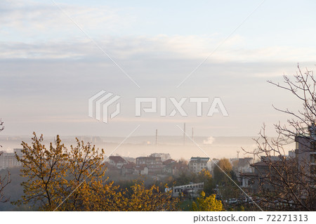 Autumn landscape. Fog covers the city center. Autumn landscape. Fog covers the city center. 72271313