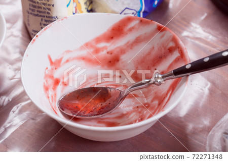 White empty jam bowl and metal spoon. White empty jam bowl and metal spoon. 72271348