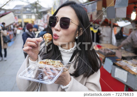 Takoyaki japanese food on the street to Fushimi Inari shrine at Kyoto,Japan. 72276633