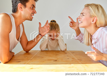 child girl sit hearing her parents yelling at each other child girl sit hearing her parents yelling at each other 72277340