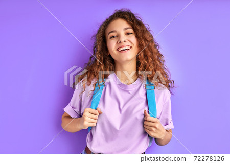 happy school girl with bag posing at camera isolated happy school girl with bag posing at camera isolated 72278126