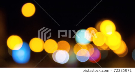 winter holidays background. garlands on the street with bokeh effect winter holidays background. garlands on the street with bokeh effect 72285971