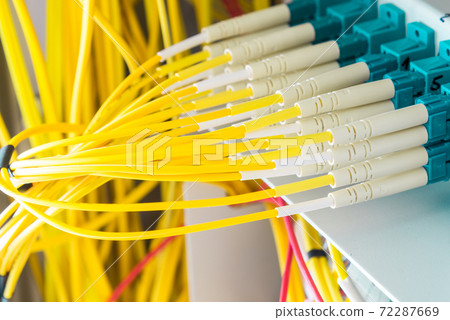 fiber optic cables connected into main data switch fiber optic cables connected into main data switch 72287669