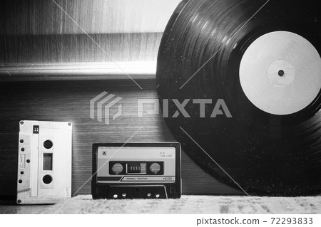 Audio cassettes and vinyl record close-up. Vintage 72293833