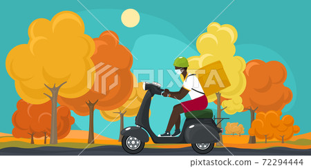 Food delivery man rides a scooter in autumn 72294444