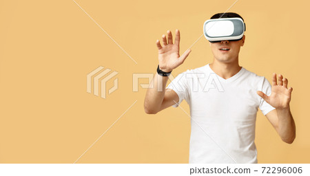 People lifestyle, hipster play in game. Surprised young student guy moves hands 72296006