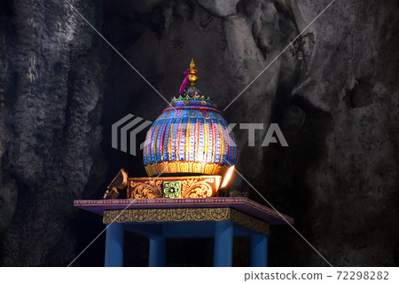 Batu Caves inside a limestone hill that has a series of caves and cave temples Batu Caves inside a limestone hill that has a series of caves and cave temples 72298282