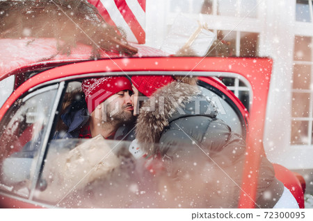 Young lovely couple buys Christmas presents for Young lovely couple buys Christmas presents for 72300095