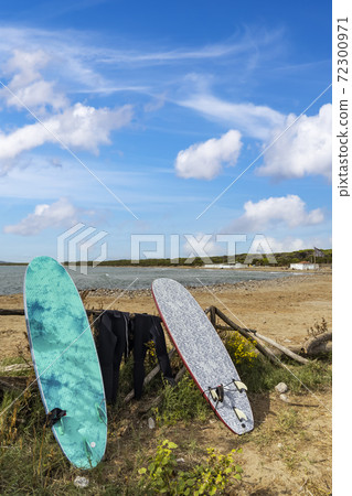 surfboards in Al Cartello beach near Orbetello, Tuscany, Italy surfboards in Al Cartello beach near Orbetello, Tuscany, Italy 72300971