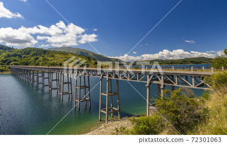 Bridge Ponte delle Stecche, Lago di Campotosto in National Park Gran Sasso e Monti della Laga, Abruzzo region, Italy Bridge Ponte delle Stecche, Lago di Campotosto in National Park Gran Sasso e Monti della Laga, Abruzzo region, Italy 72301063